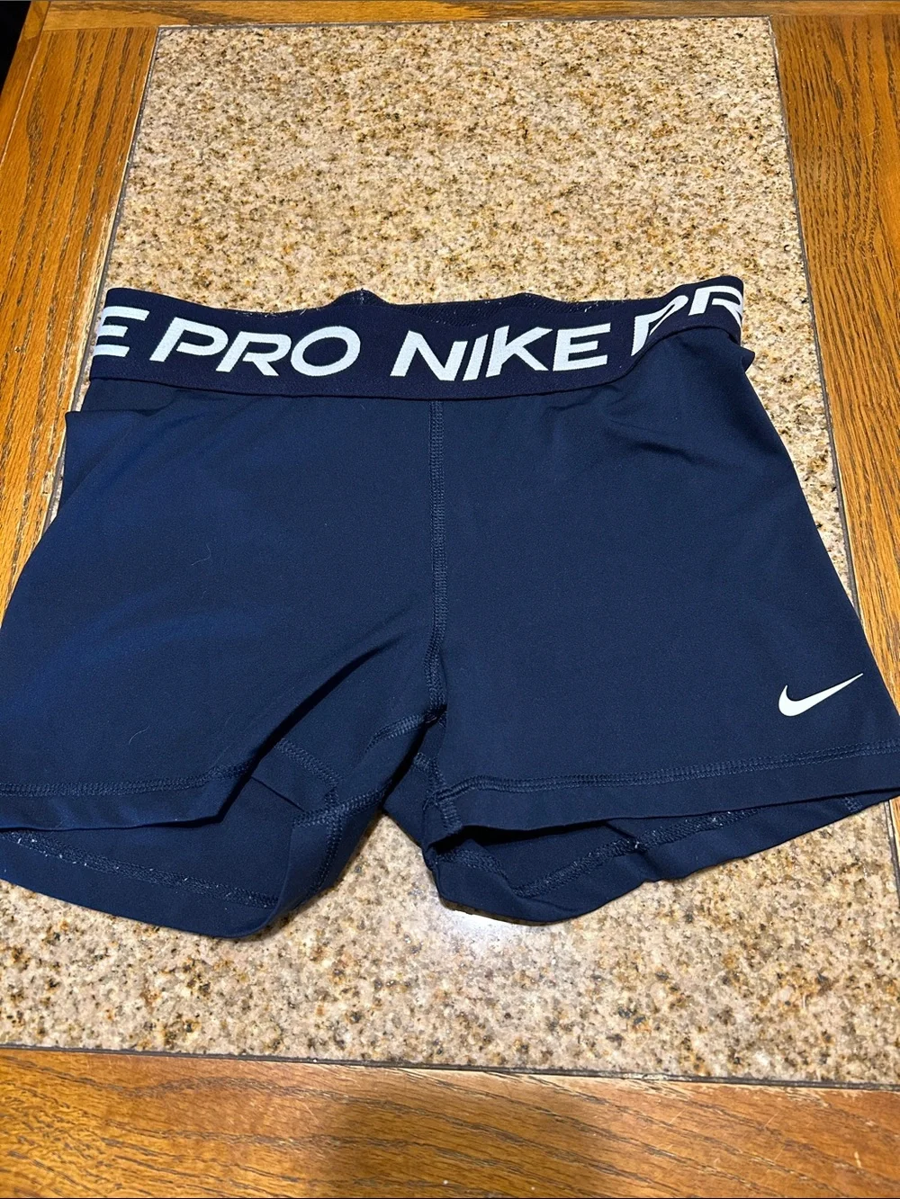 Nike Navy Athletic Compression Shorts with White Swoosh